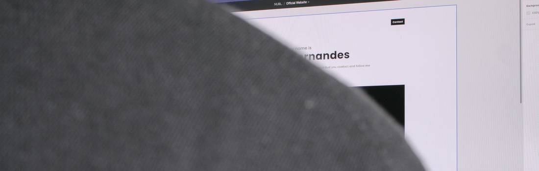 A developer using browser tools to troubleshoot a broken image on a modern website