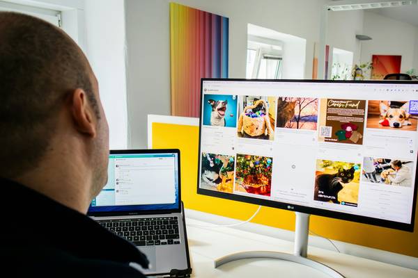 Web designer's workspace showing layouts and placeholder images